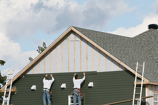 Professional Siding Installation technician working in South Solon, OH